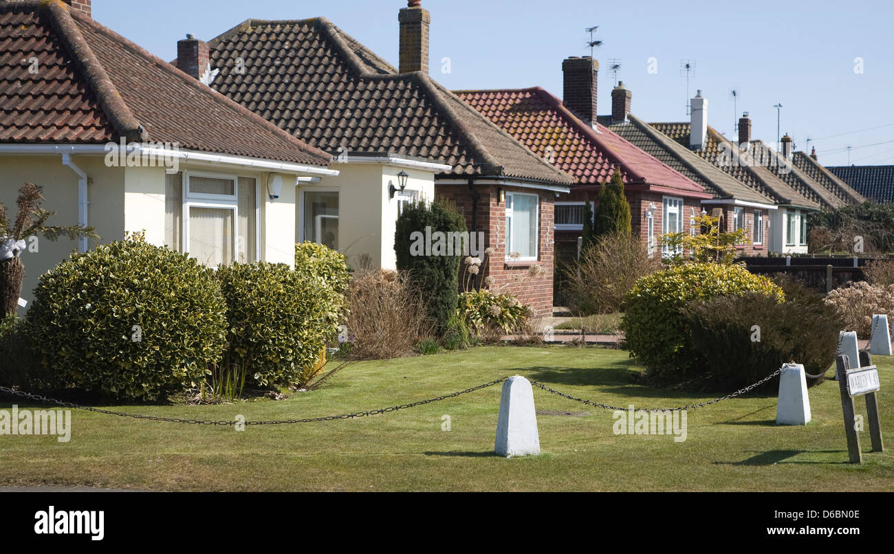 Bungalow private owner occupied housing at Frinton on Sea, Essex, England Stock Photo