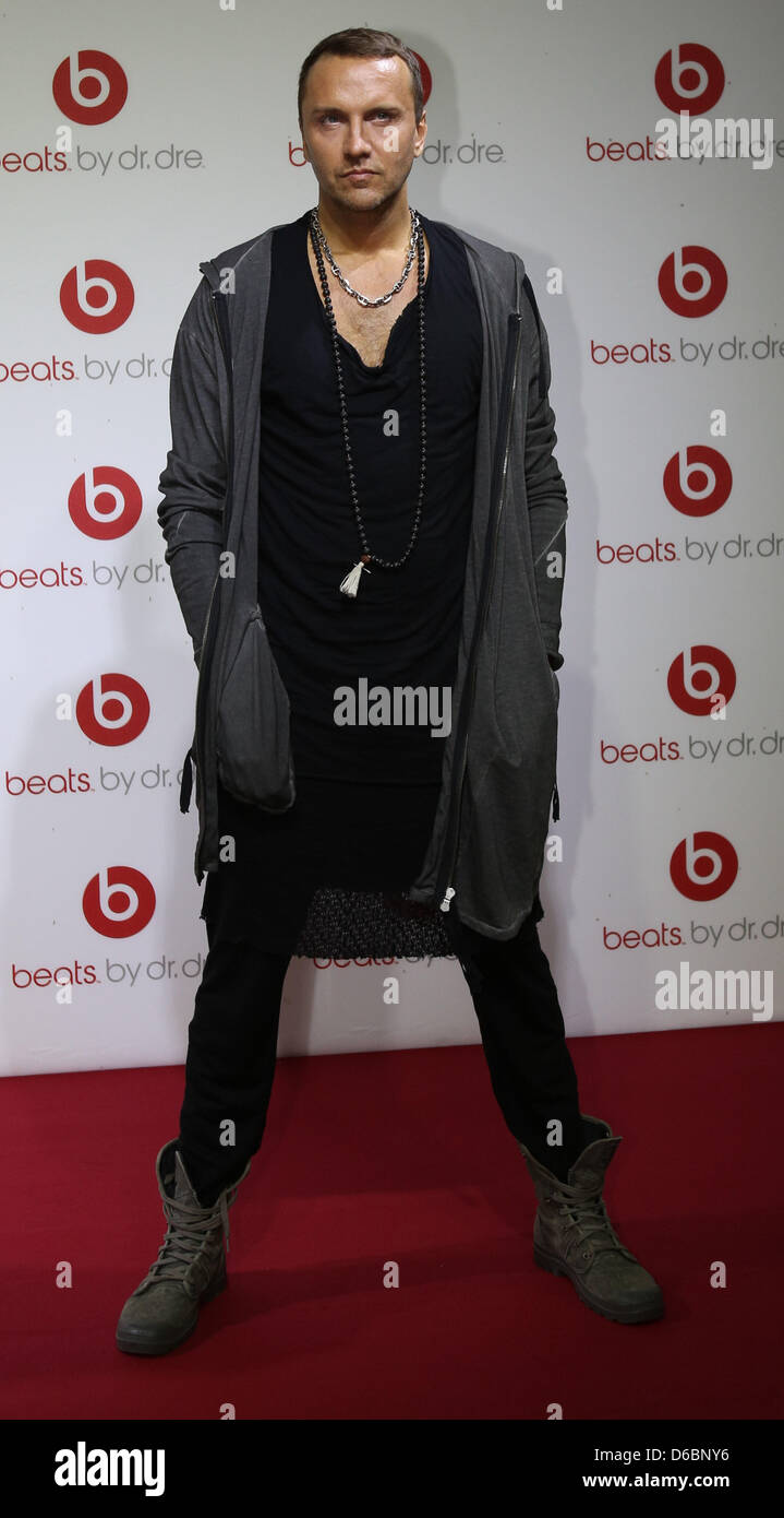 Actor Hubertus Regout poses for pictures on the red carpet outside the nightclub 'Spindler und Klatt' in Berlin, Germany, 04 September 2012. The 'Beats Berlin Party' was sponsored by the 'Beats by Dr. Dre' headphone brand and attracted many celebrities. Photo: Florian Schuh Stock Photo