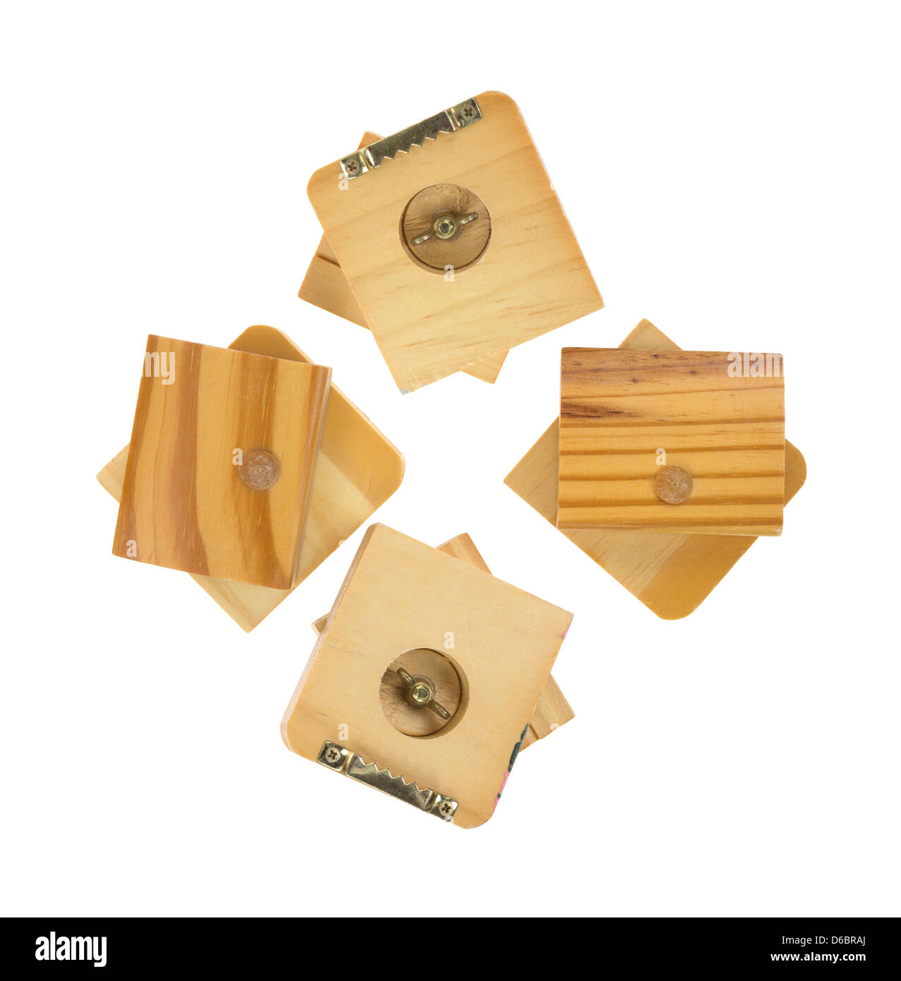 Four unfinished wood tapestry hangers on a white background Stock Photo