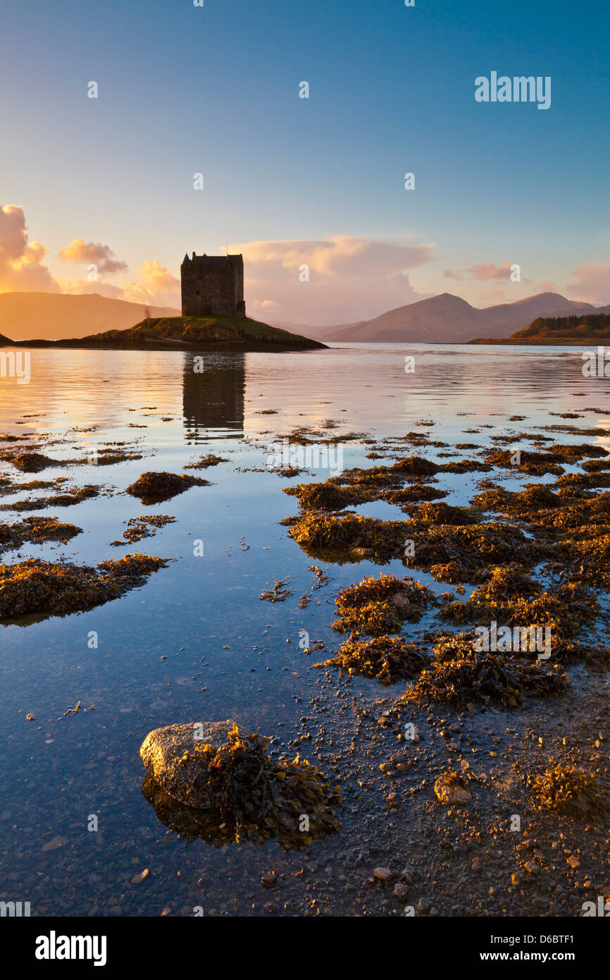 Silhouette at sunset of Castle Stalker Loch Laich Loch Linnhe Port Appin Argyll Scotland scottish highlands, UK, GB, Europe Stock Photo