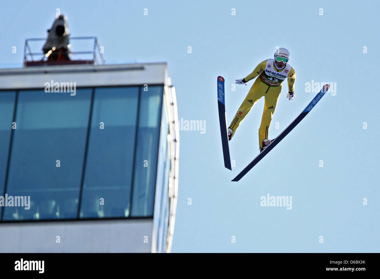 German ski jumper Maximillian Mechler jumps during the third jump of the qualification round at the 60th Four Hills Tournament in Innsbruck, Austria, 03 January 2012. Photo: DANIEL KARMANN Stock Photo
