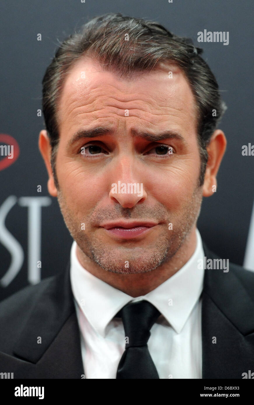 French actor Jean Dujardin poses on the red carpet at the Delphi Film  Palace on the occasion of the German premiere of the movie 'The Artist' in  Berlin, Germany, 03 January 2012.