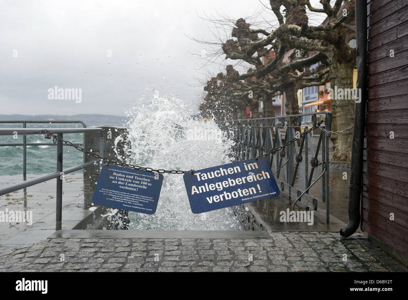 Waves hit the pier in Meersburg at Lake Constance, Germany, 05 January 2012. Stormy depression 'Andrea' brings rainfalls and squalls almost almost all over Germany through the day. Photo: TOBIAS KLEINSCHMIDT Stock Photo