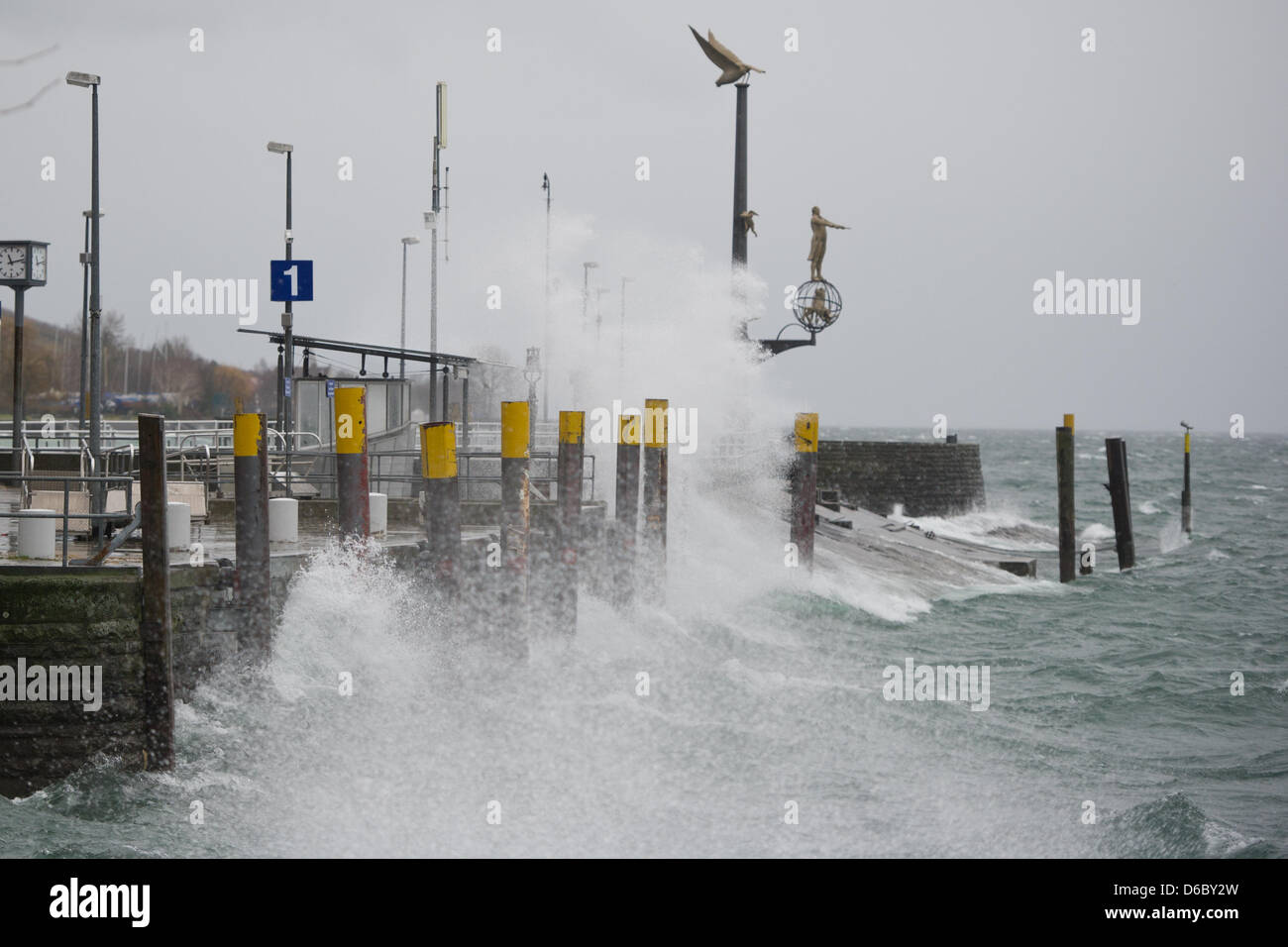 Waves hit the pier in Meersburg at Lake Constance, Germany, 05 January 2012. Stormy depression 'Andrea' brings rainfalls and squalls almost almost all over Germany through the day. Photo: TOBIAS KLEINSCHMIDT Stock Photo