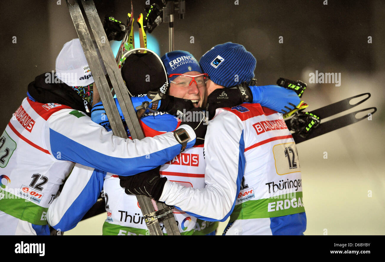 Italian biathlete Lukas Hofer (C) celebrates his victory with his team-mates during the men's 4x7.5km relay of the Biathlon World Cup in Oberhof, Germany, 05 January 2012. Italy finished first, ahead of Russia and Sweden. Photo: Martin Schutt Stock Photo