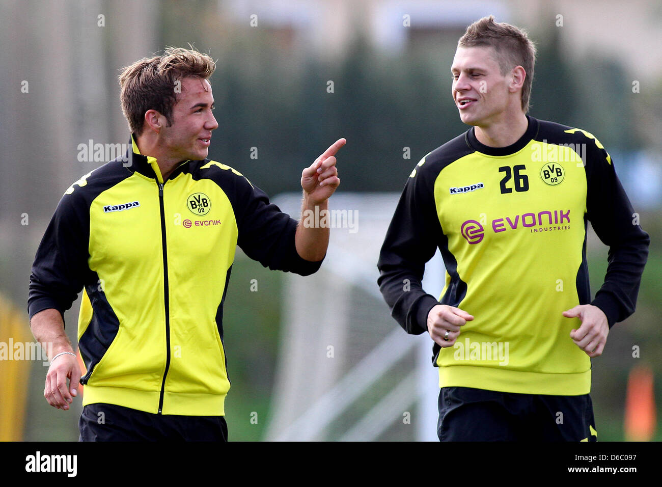 Dortmund S Mario Goetze L And Teammate Lukasz Piszczek Talk During Stock Photo Alamy