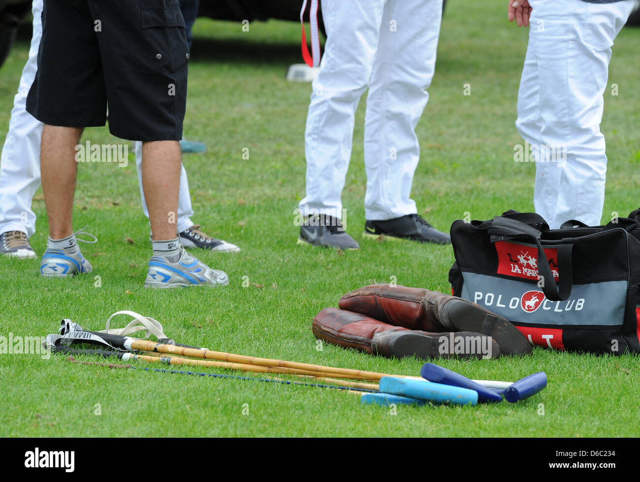 Mallets, riding boots and a polo bag 