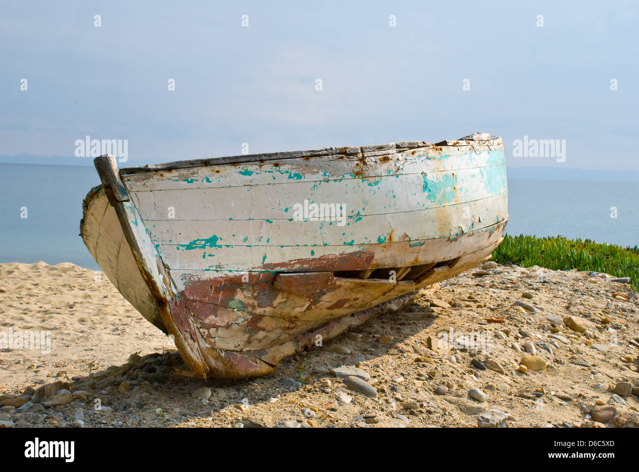 Old wooden boat on beach sunset hi-res stock photography and images - Alamy