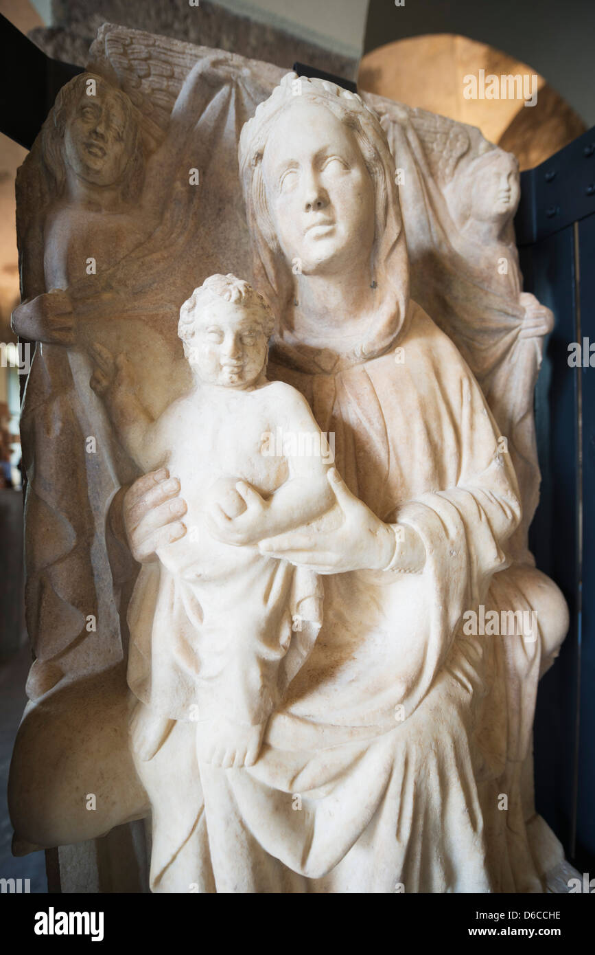 Europe, Italy, Lombardy, Milan, museum at Castle Sforzesco, 14th century sculpture of madonna and child by Viboldone Stock Photo