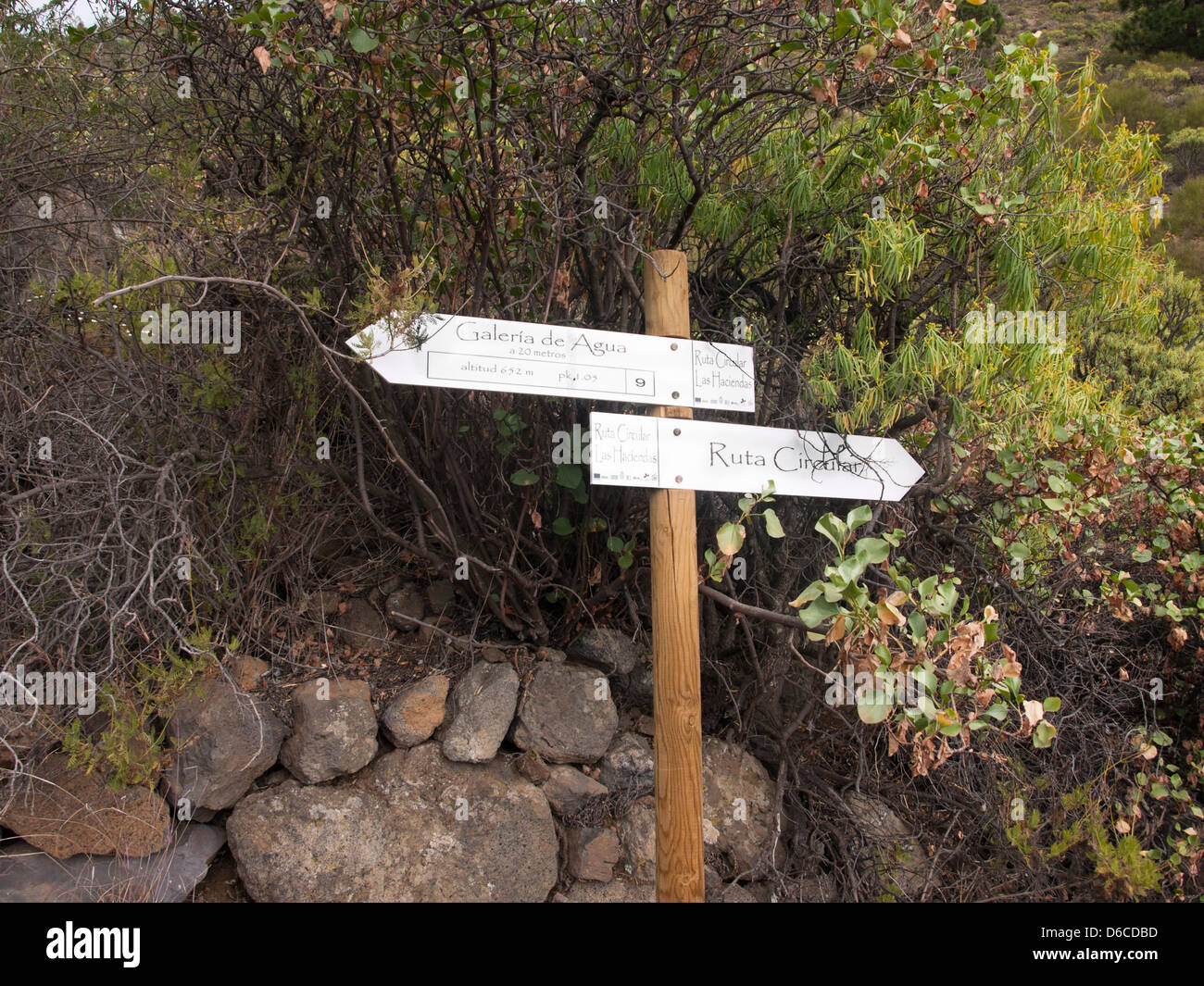 Signpost for visitors about the hiking paths near Araya in Tenerife Spain, interpretative walk about water and farming Stock Photo