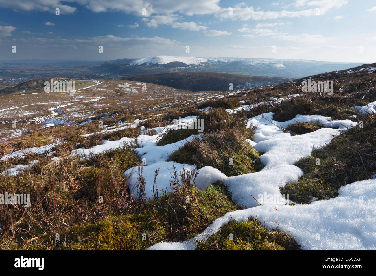 Patches of snow melting on the slopes of Sugar Loaf mountain. Near Abergavenny. Brecon Beacons National Park. Wales, UK. Stock Photo