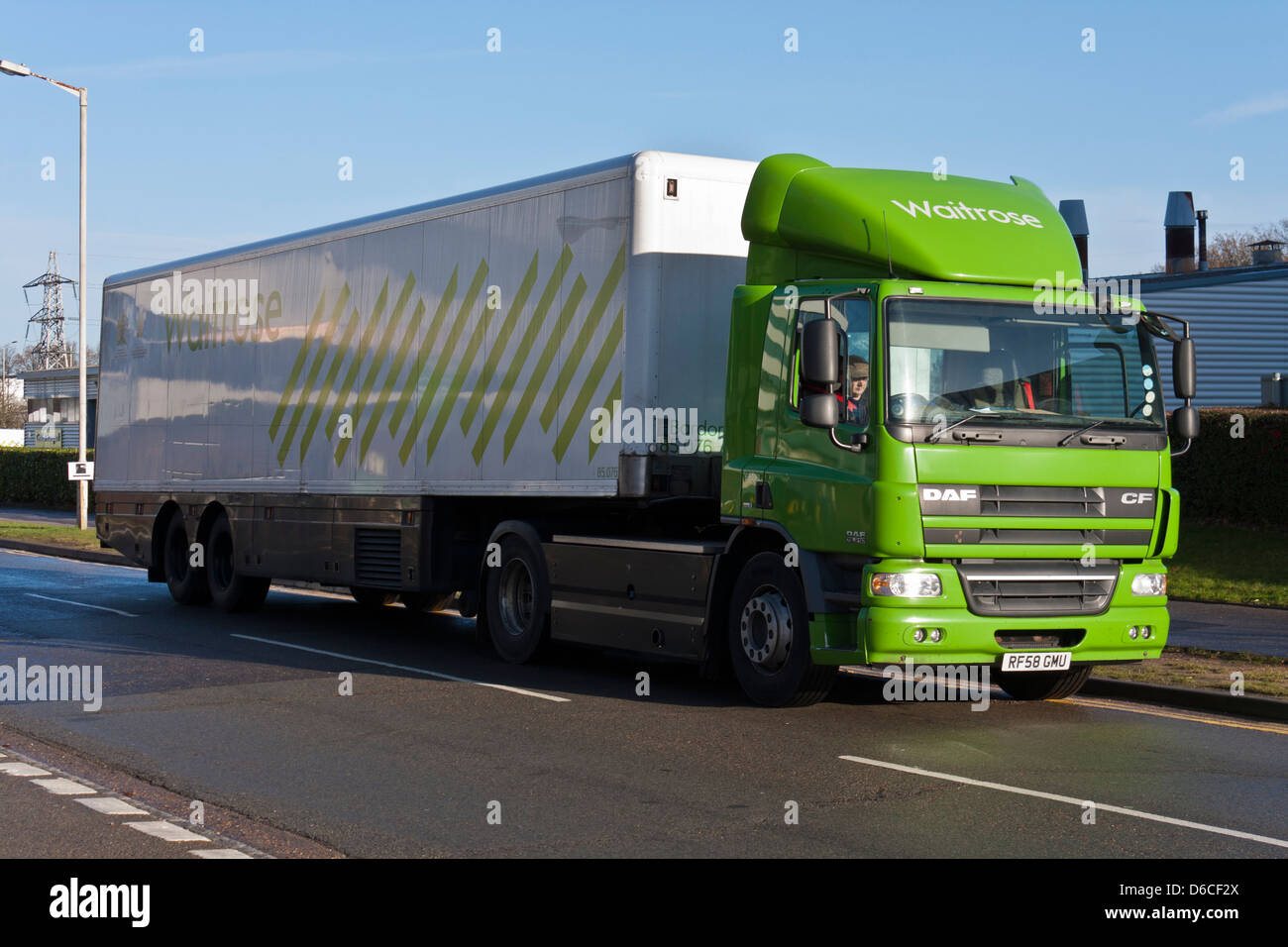 Waitrose supermarket HGV food truck on the road. Bracknell, Berkshire, England, GB, UK Stock Photo