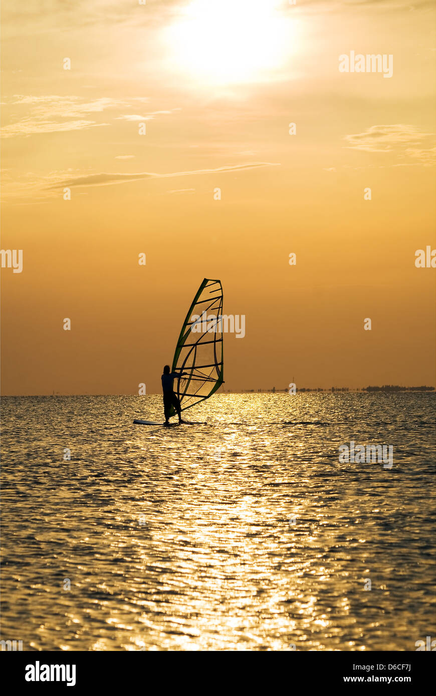 Silhouette of a windsurfer on a sunset Stock Photo