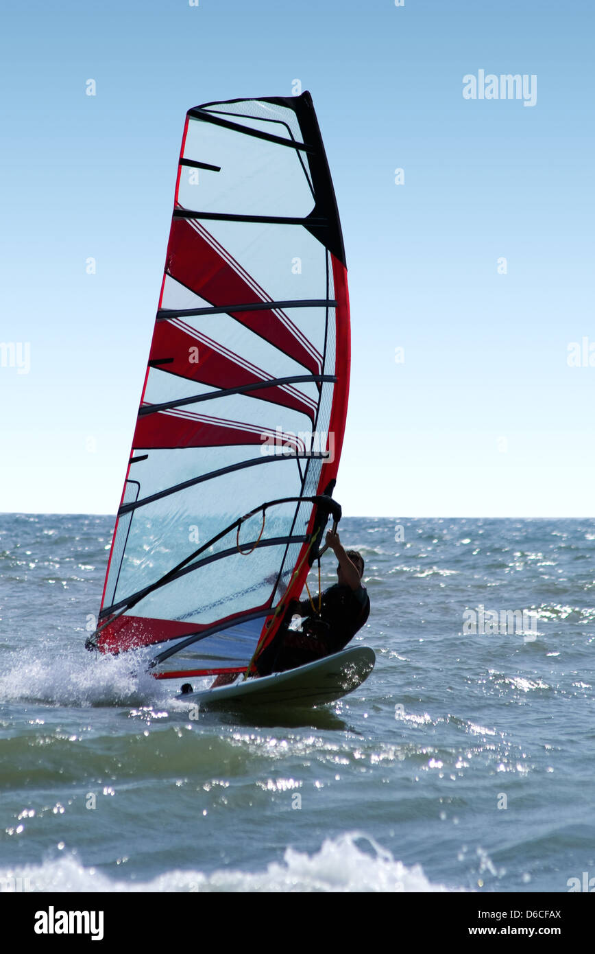 Windsurfer on waves of a sea 3 Stock Photo