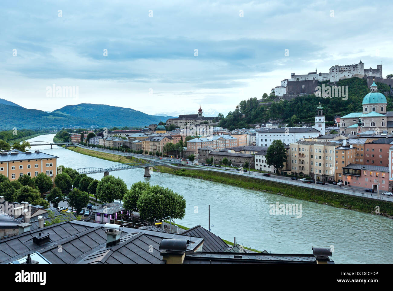 Evening summer Salzburg City view from up and Hohensalzburg Fortress on mountain top behind (Austria) Stock Photo