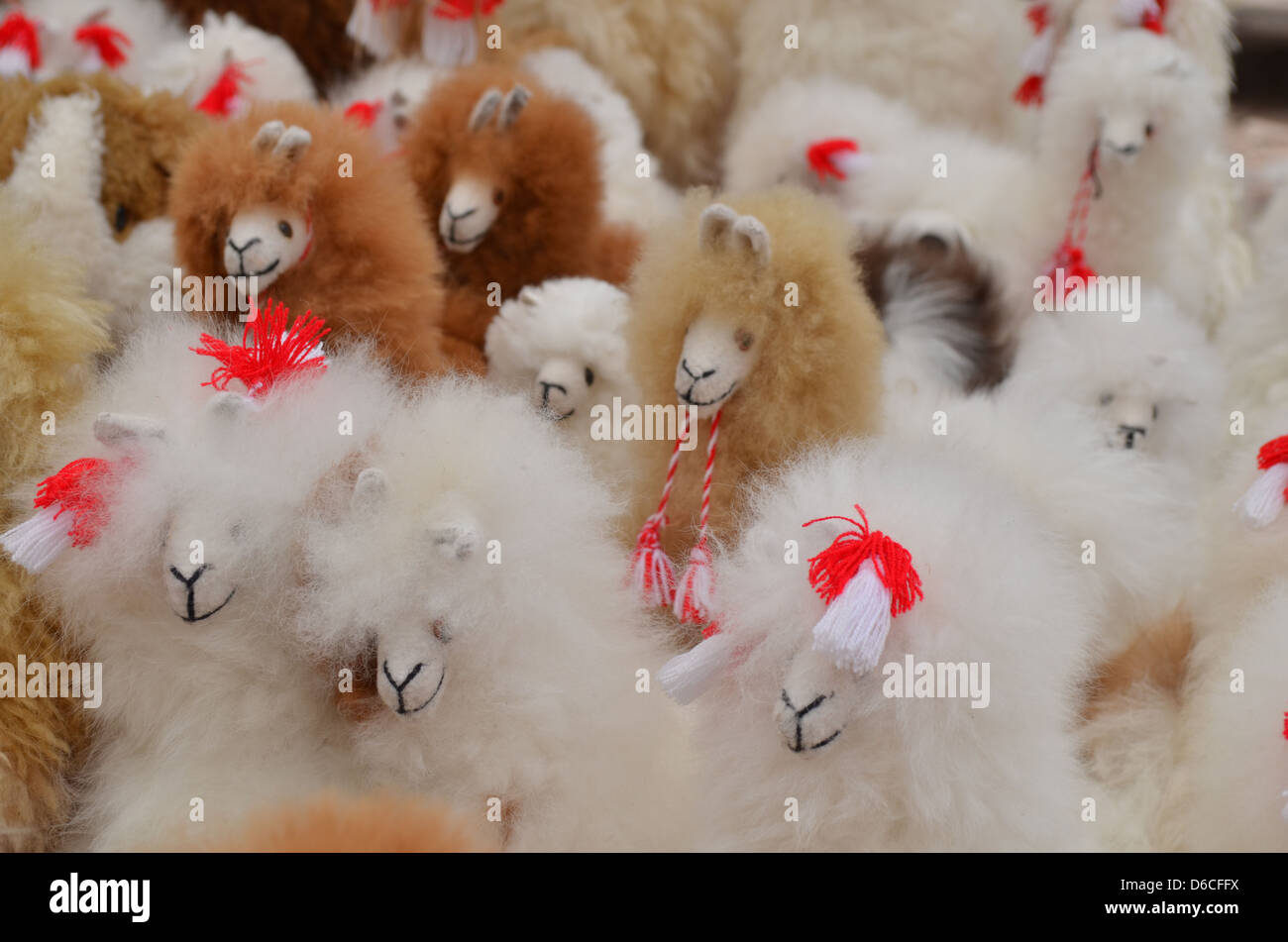 Llama toys on sale in a market in Peru Stock Photo