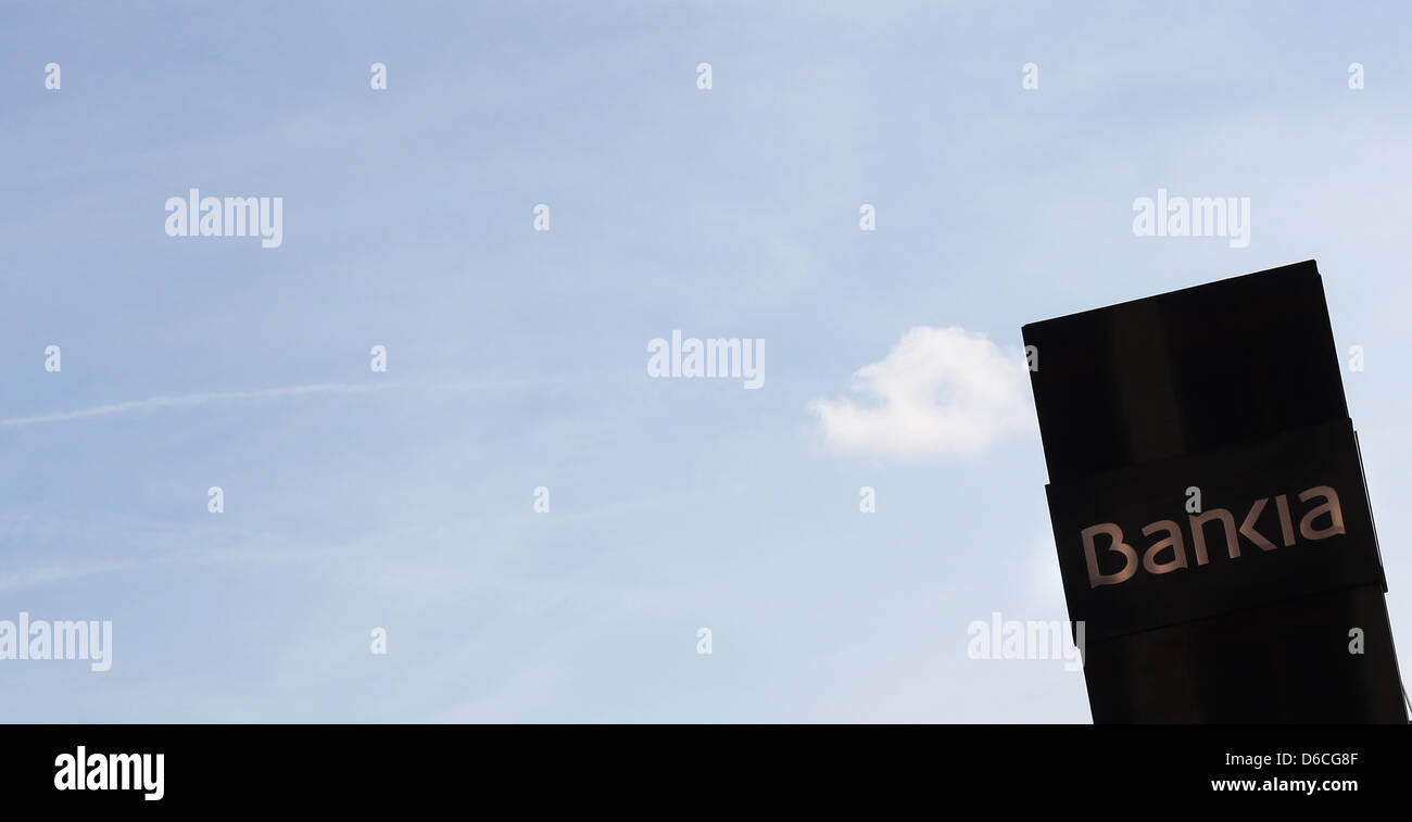 The logo of the Spanish state-owned bank Bankia, photographed on a column in front of the bank's headquarter in Madrid on 15.04.2013. Photo: Fabian Stratenschulte Stock Photo