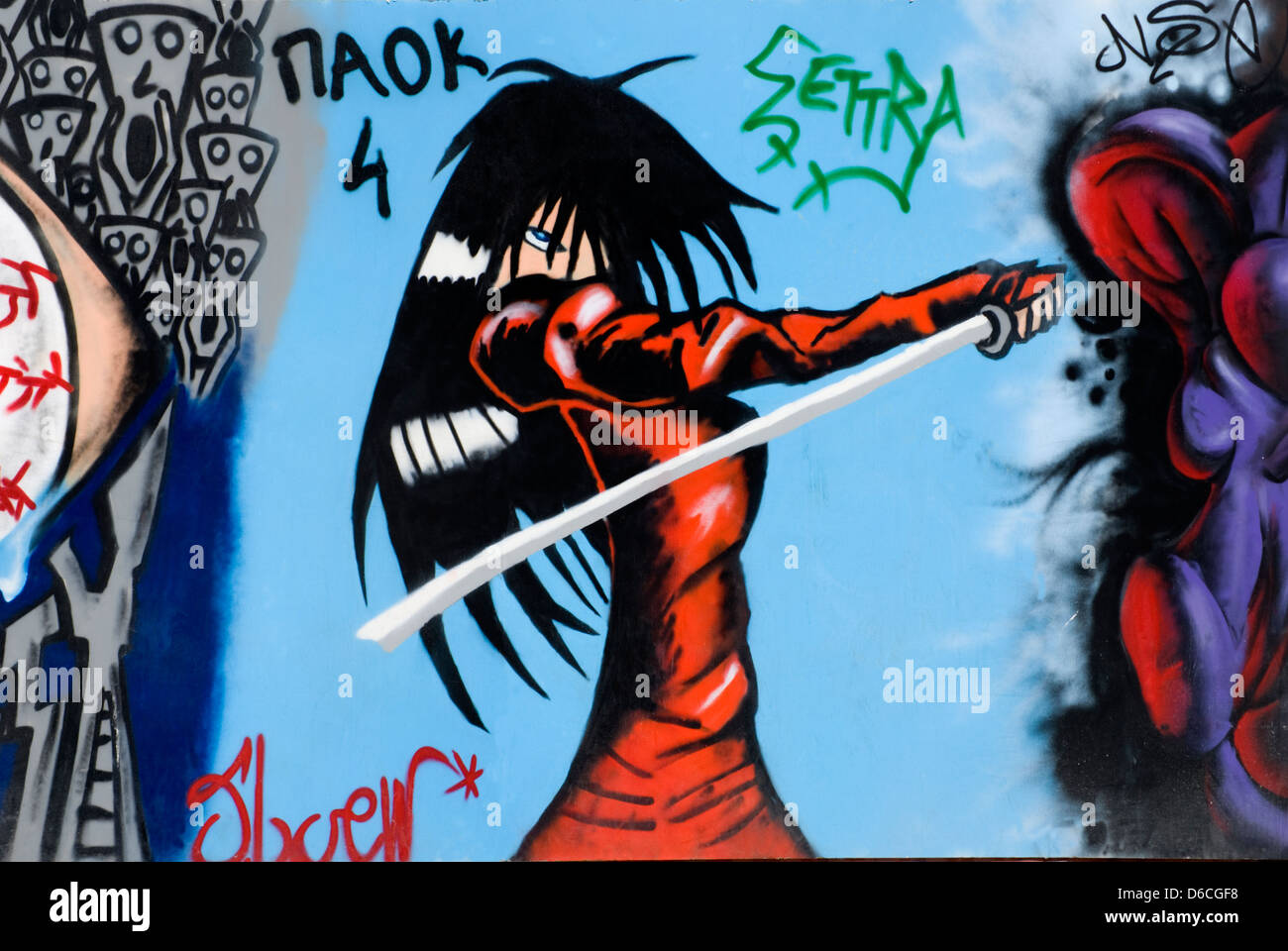 Heraklion, Iraklio, Crete, Greece. Graffiti - woman with Samurai Sword Stock Photo