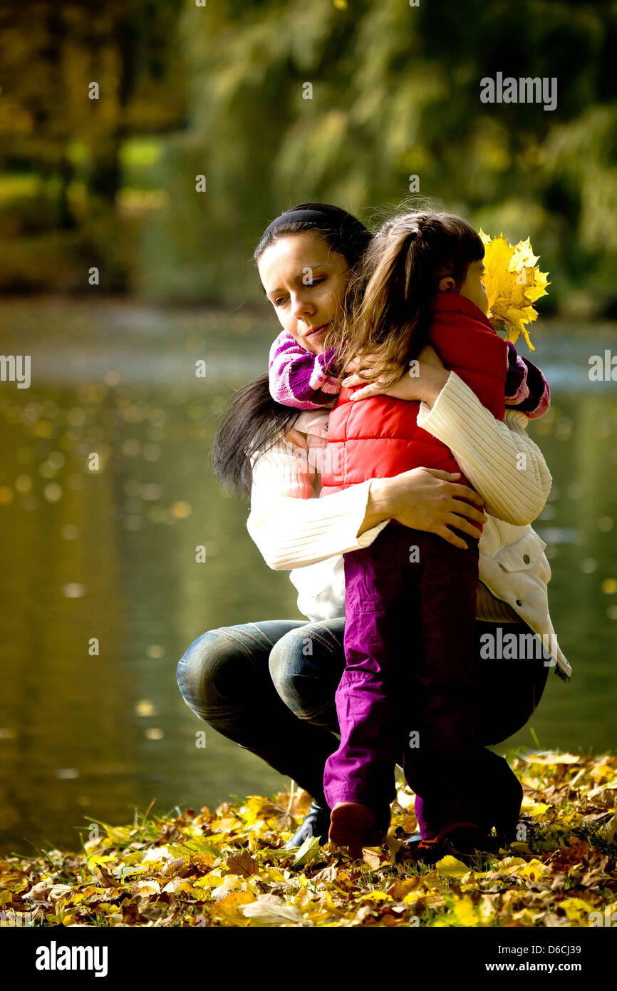 little girl in the autumn park Stock Photo - Alamy