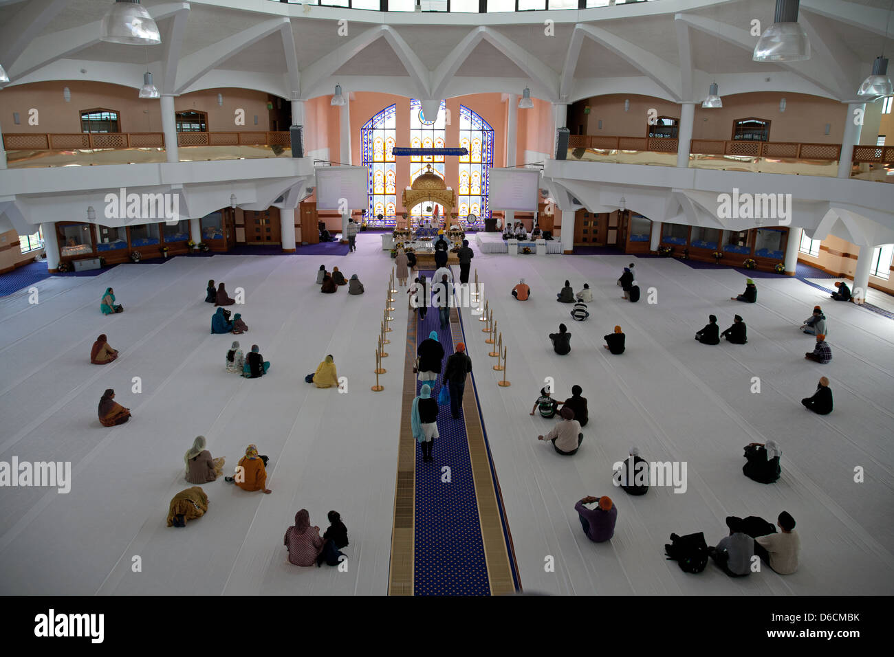 Pray hall Interior  of The Gurdwara Sri Guru Singh Sabha Southall Stock Photo