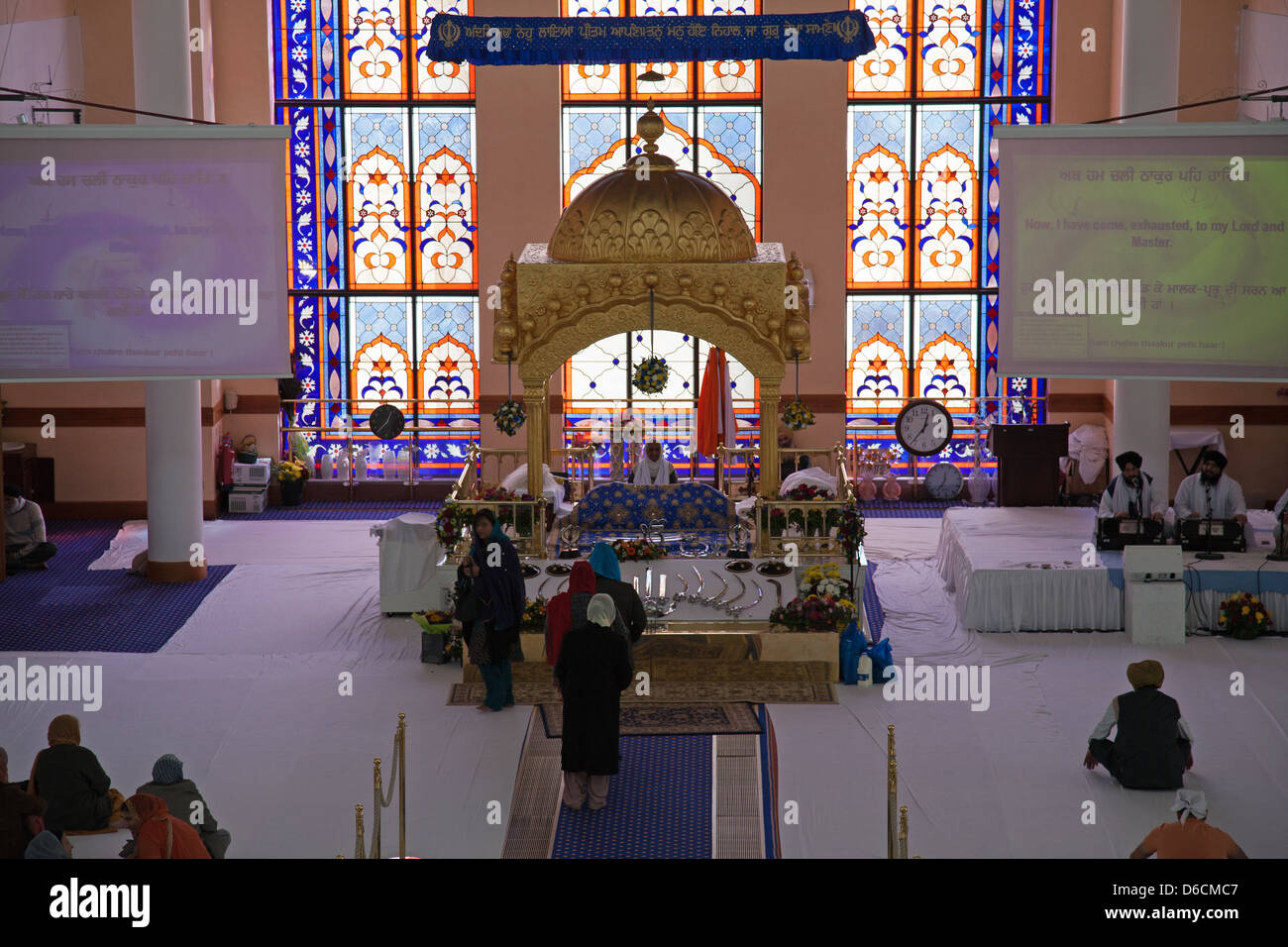 Pray hall Interior  of The Gurdwara Sri Guru Singh Sabha Southall Stock Photo