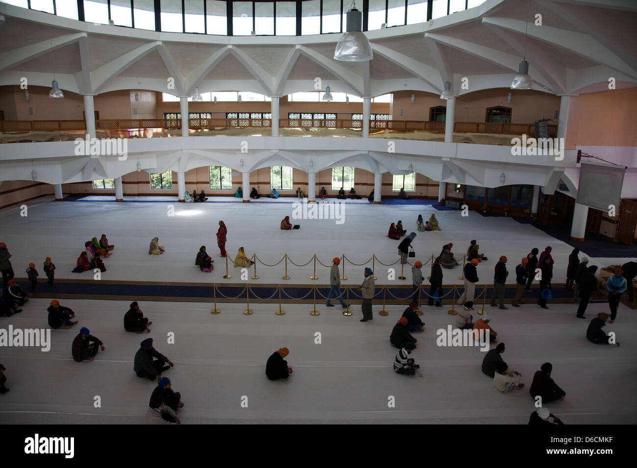 Pray hall Interior  of The Gurdwara Sri Guru Singh Sabha Southall Stock Photo