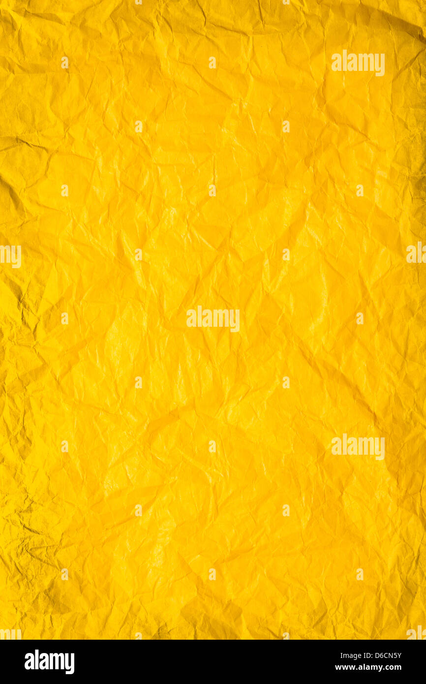 Yellow crumpled paper background texture hi-res stock photography