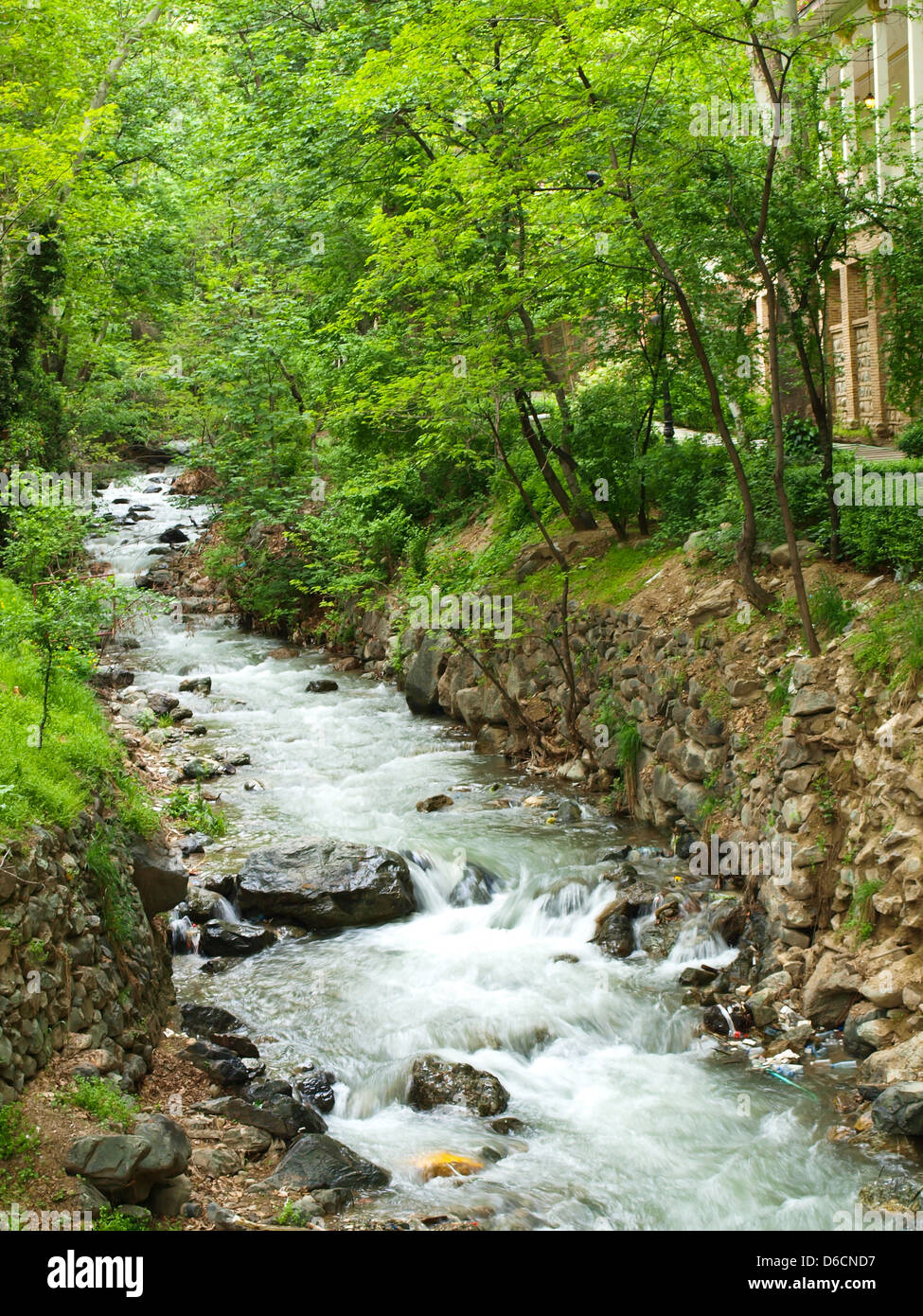 Forest stream running over rocks in Tehran, Iran Stock Photo