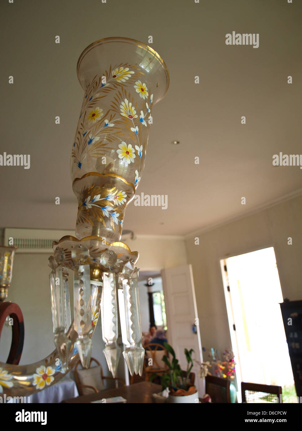 Floral glass lantern in living room Stock Photo