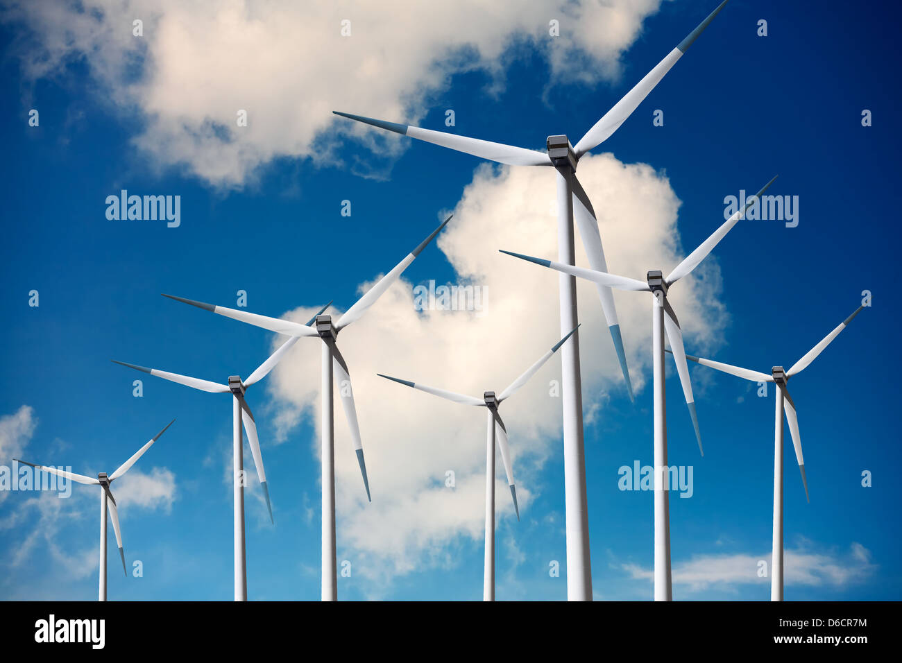 Wind turbines on blue sky Stock Photo - Alamy