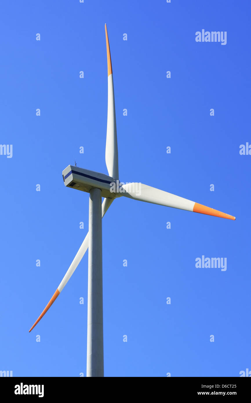 Wind turbine on blue sky Stock Photo - Alamy