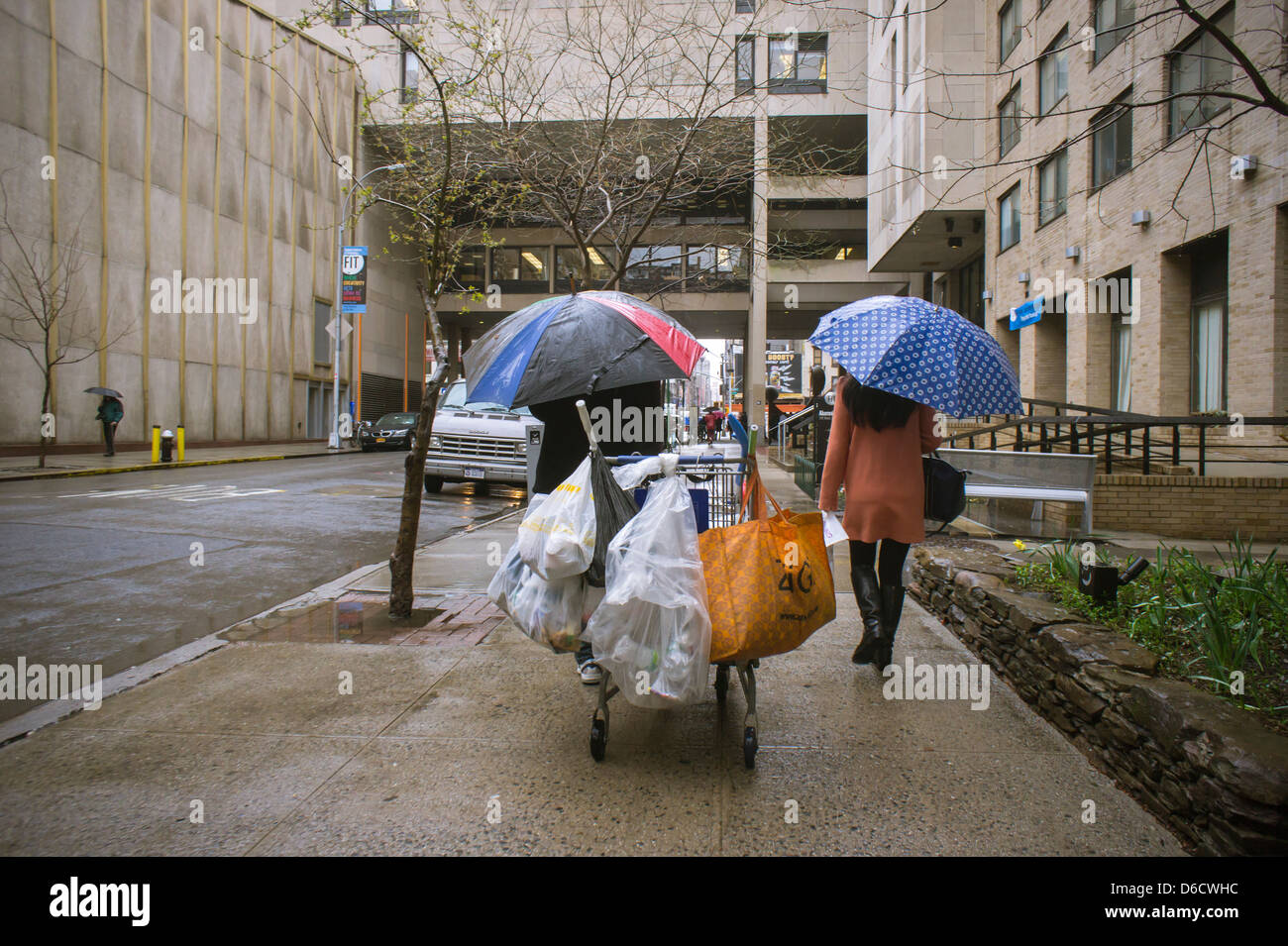 A deposit bottle collector passes a pedestrian in the Chelsea