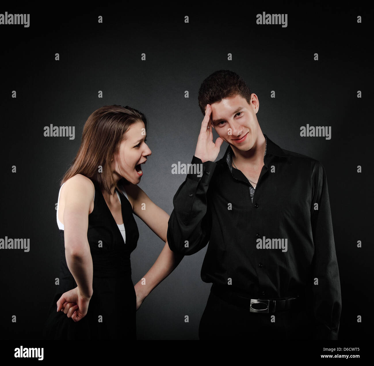 Portrait of a young couple screaming Stock Photo
