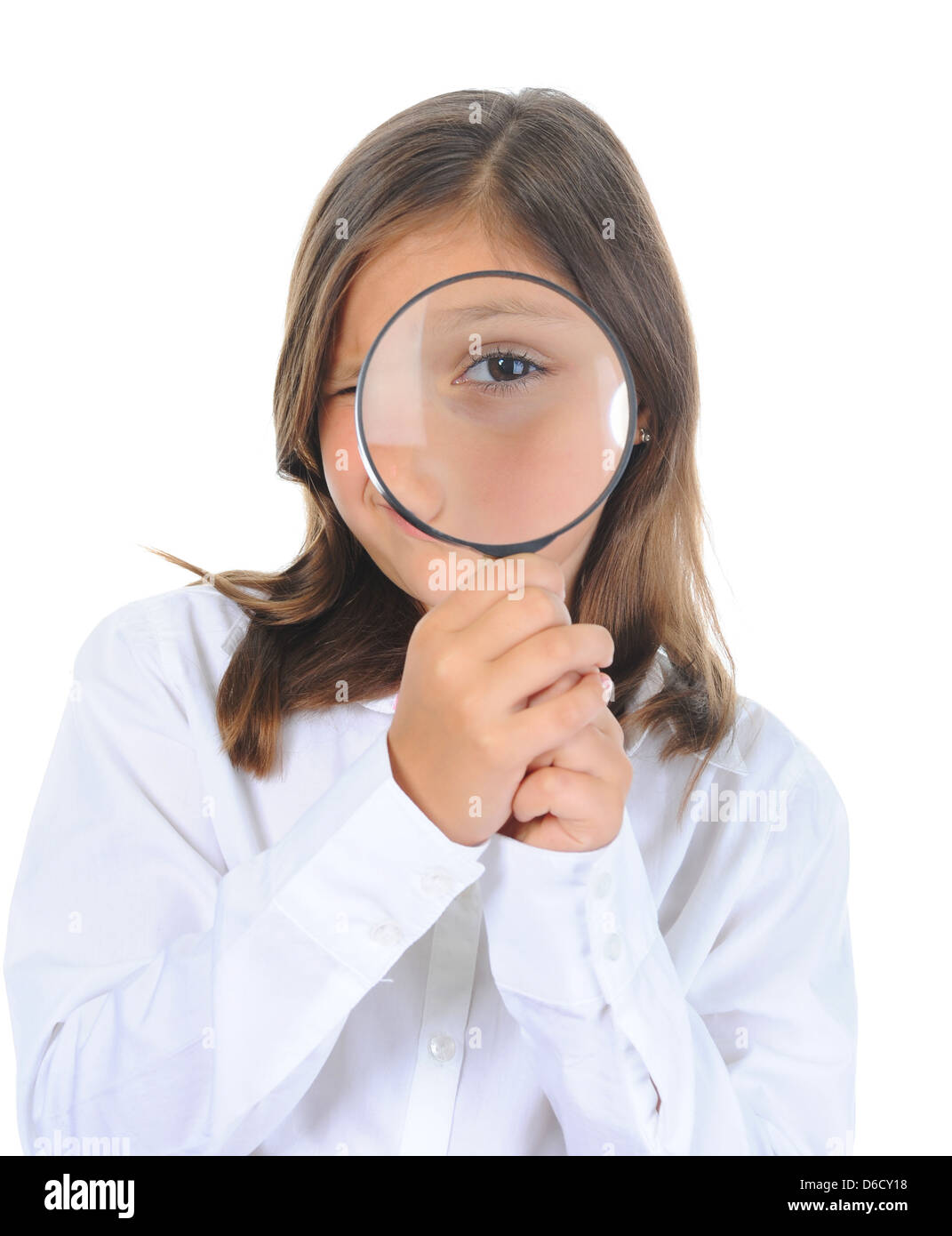 girl looking through a magnifying glass Stock Photo - Alamy