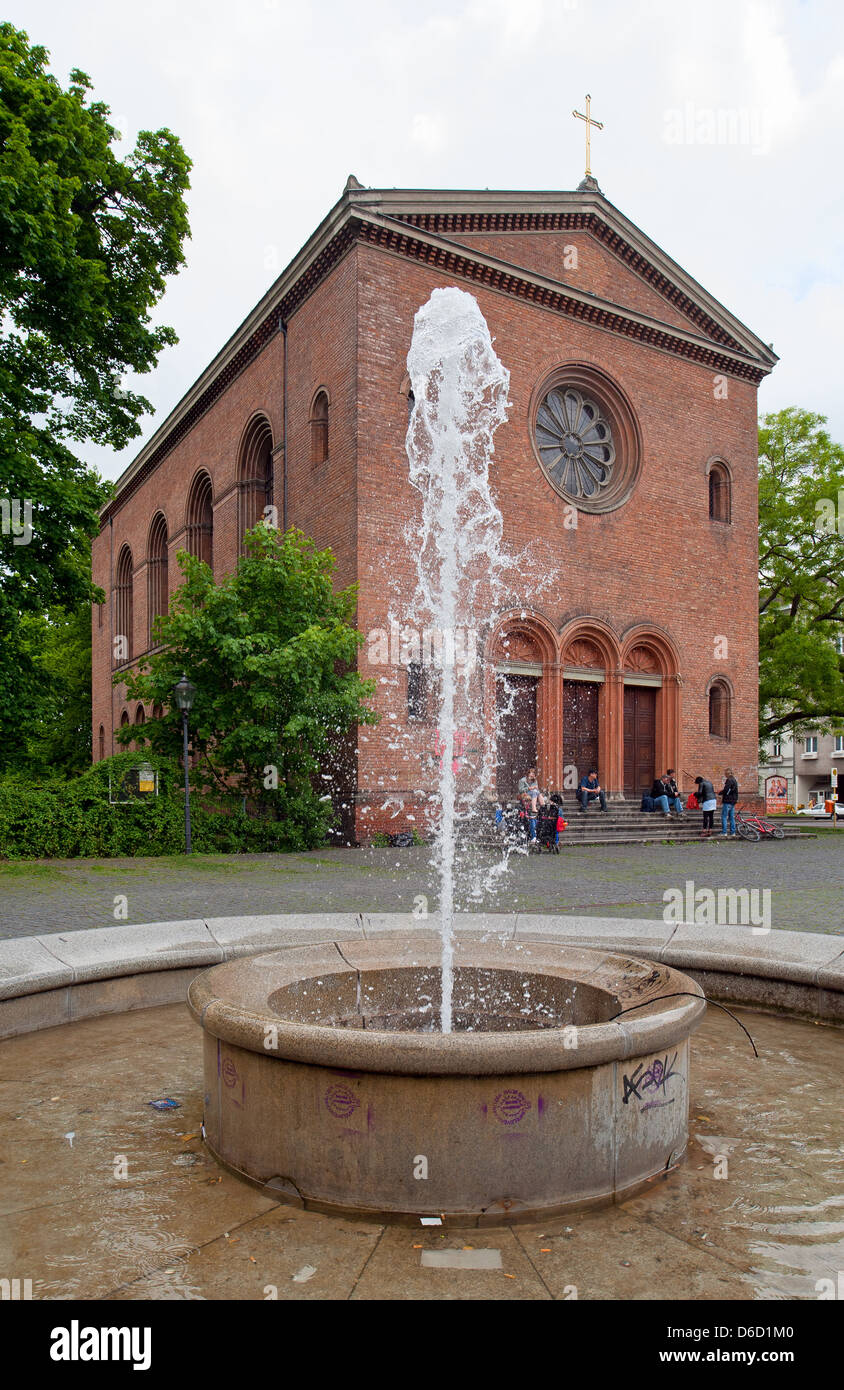 Well with age Nazareth Church on the Leopold Square in Berlin's Wedding Stock Photo