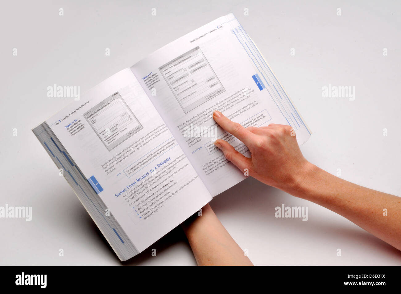 hand holding text book Stock Photo