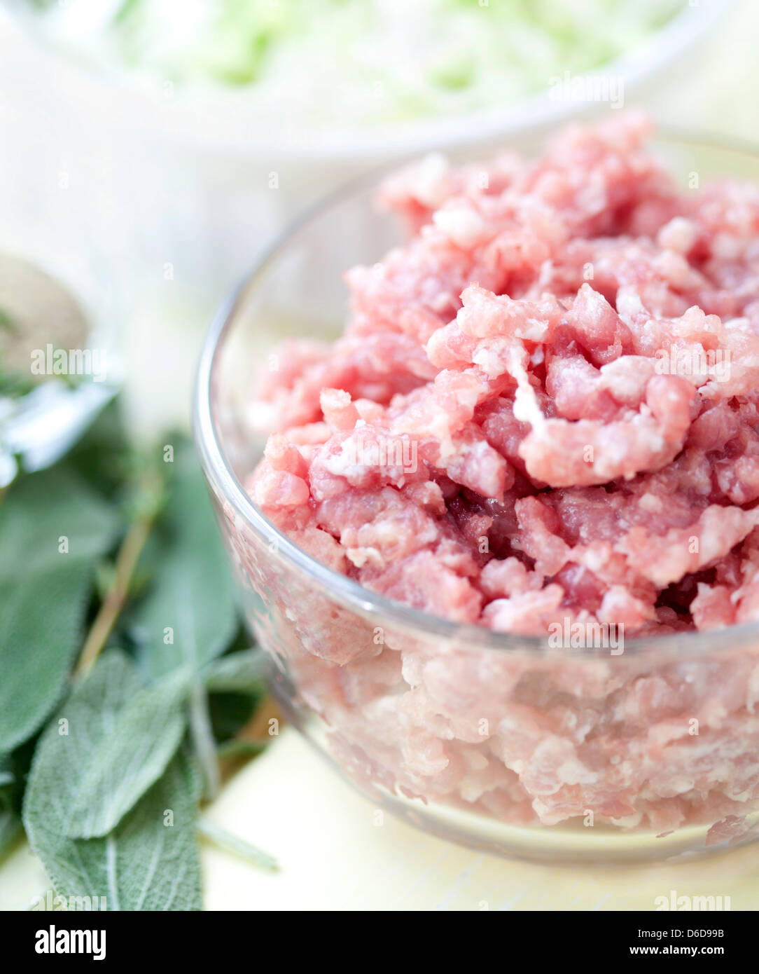 Ground Pork with ingredients on a wooden table Stock Photo