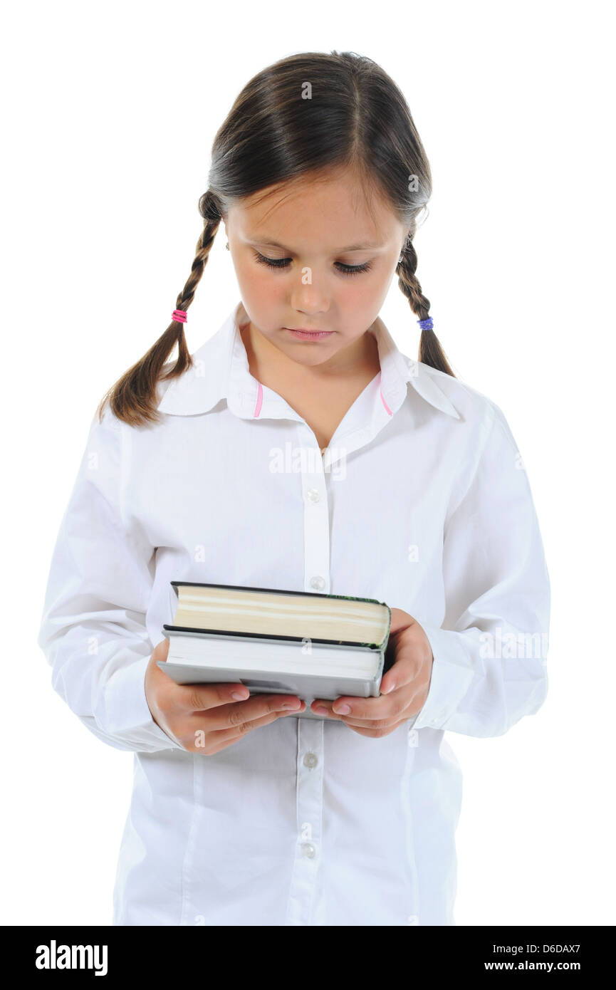 Little girl holding her book Stock Photo - Alamy