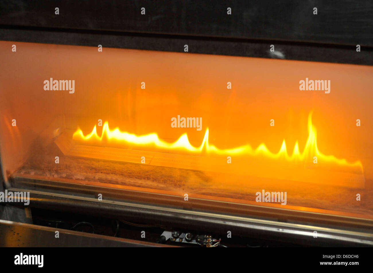 Burning gas fire at fireplace Stock Photo Alamy