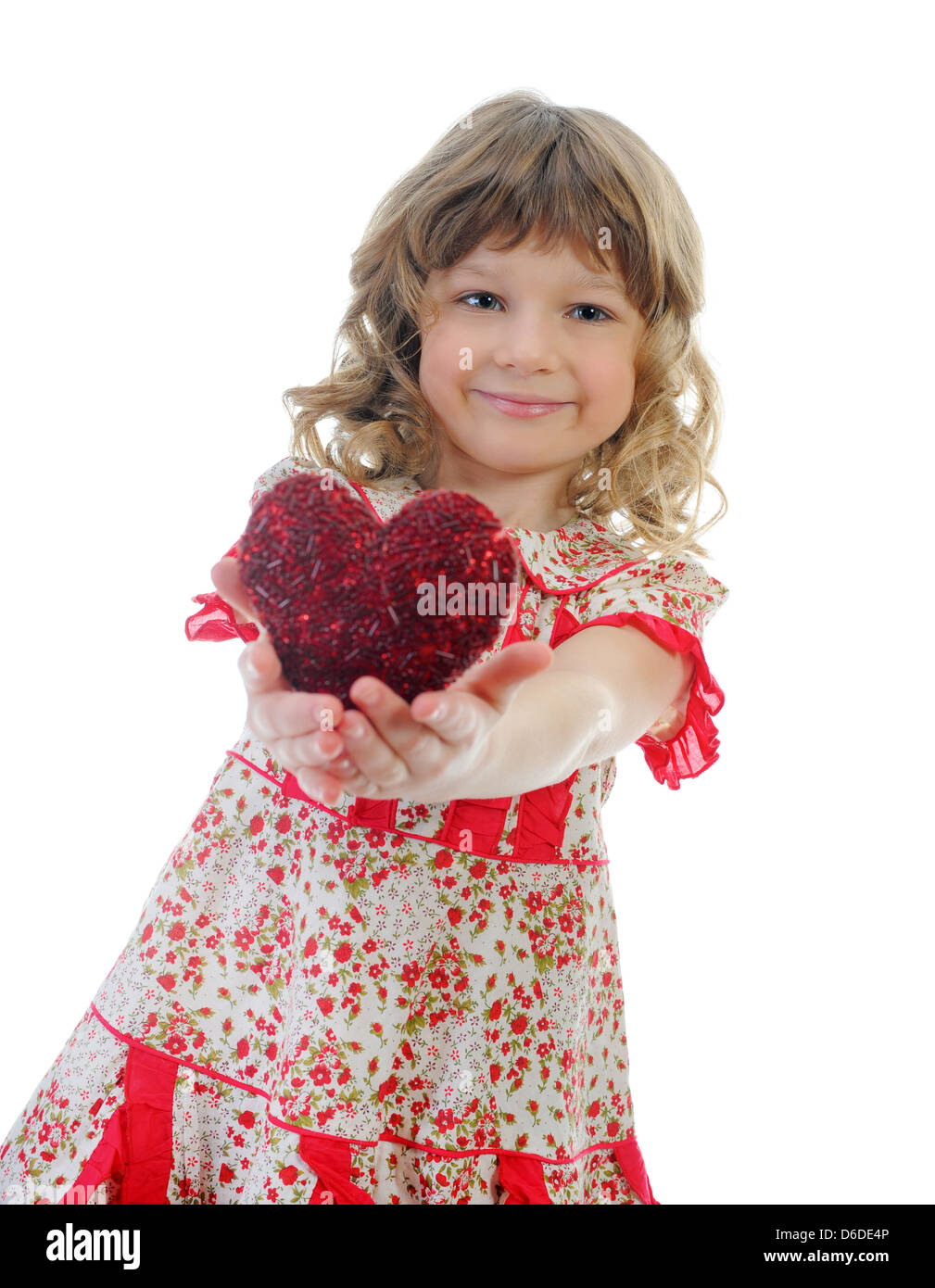 Little girl holding heart Stock Photo - Alamy