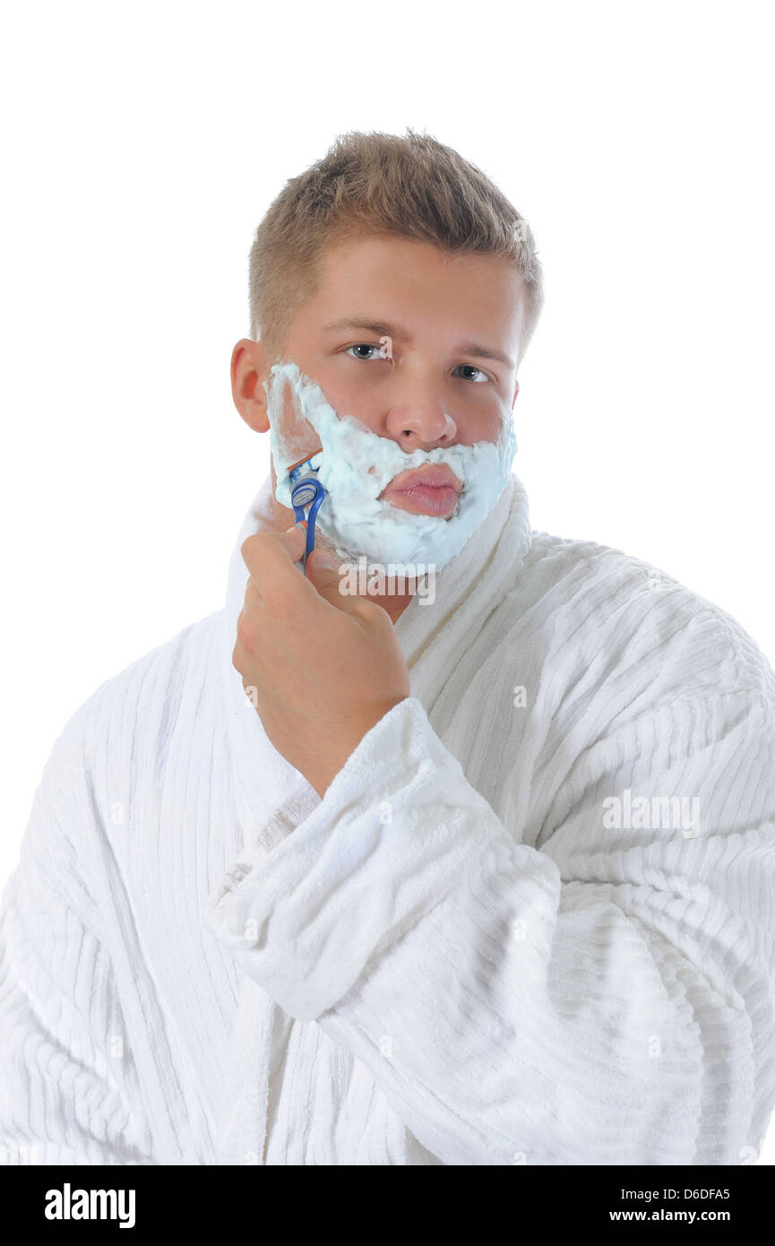 Young man shaving Stock Photo Alamy