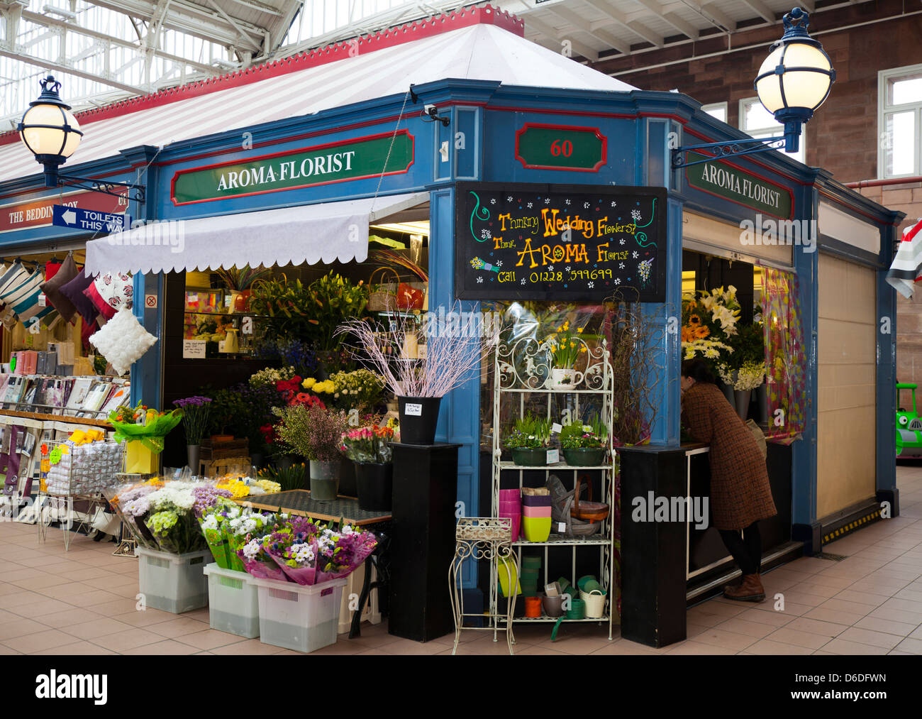 Aroma Florist, Indoor market stall, a Flower shop in Carlisle market hall, Cumbria, UK Stock Photo