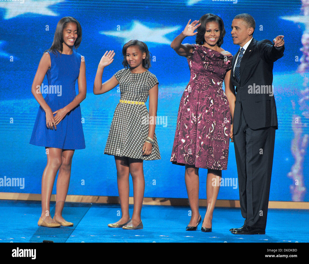 United States President Barack Obama And His Family On The Podium 