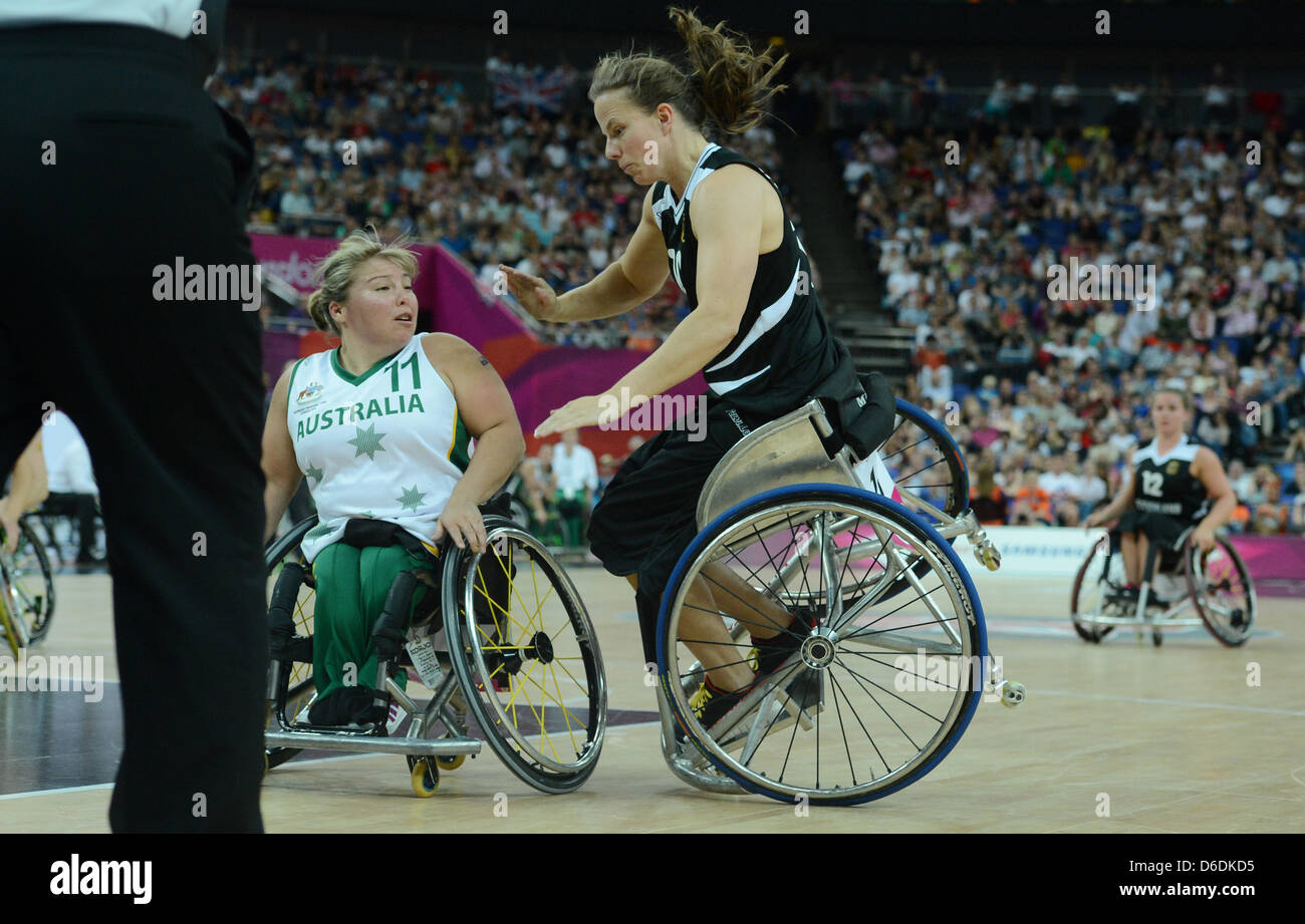 Gesche Schünemann (r) of Germany and Kylie Gauci of Australia crash into each other during the women's wheelchair basketball final match between Germany and Australia at North Greenwich Arena during the London 2012 Paralympic Games, London, Great Britain, 07 September 2012. Germany won 58:44 against Australia. Photo: Julian Stratenschulte dpa Stock Photo