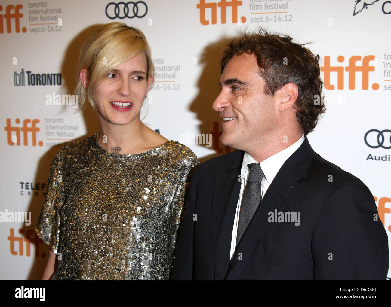 Actor Joaquin Phoenix and Heather Christie arrive at the premiere of "The Master" during the