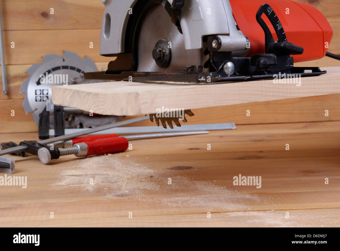circular saw and accessories on the board Stock Photo
