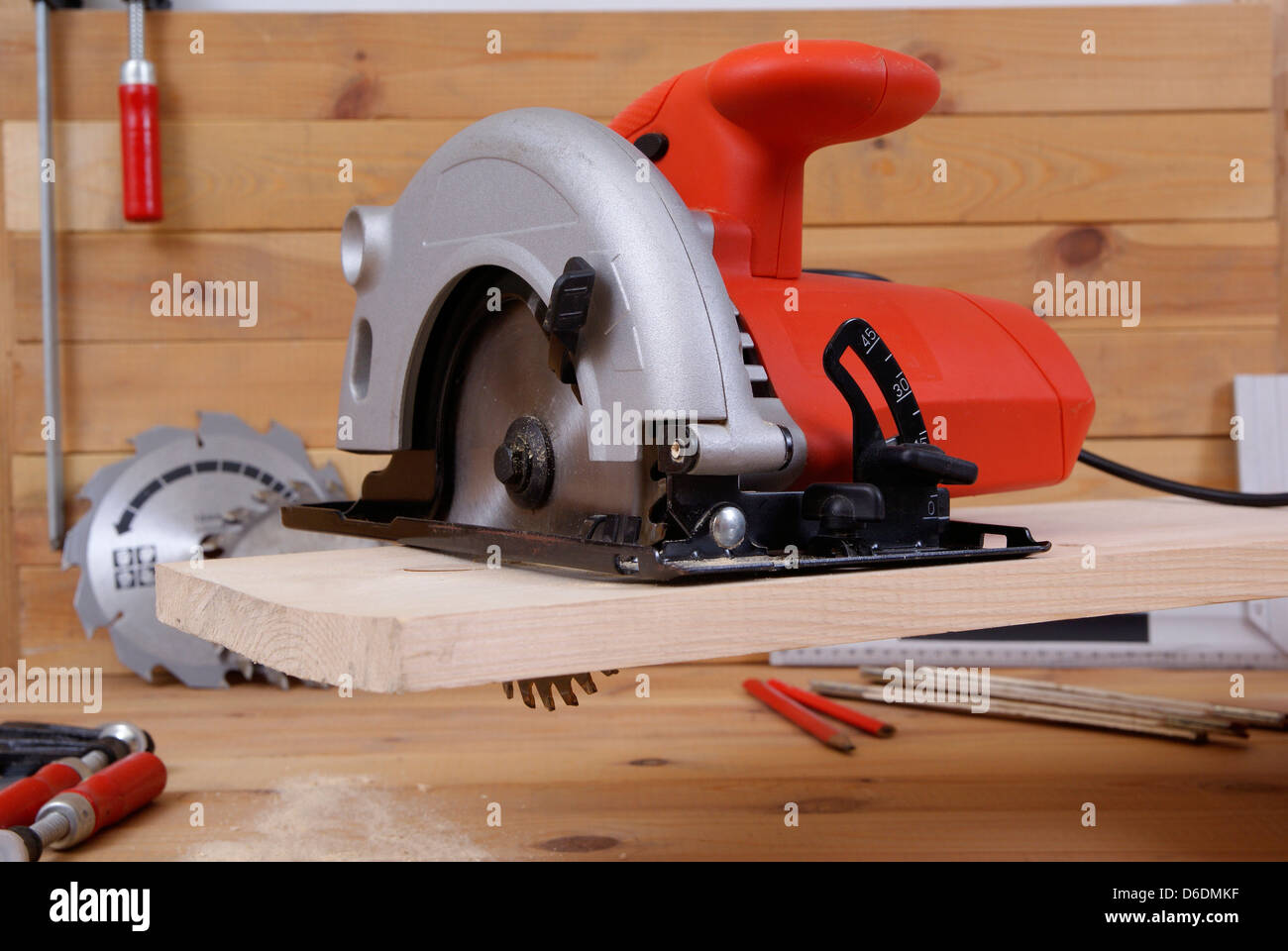 circular saw and accessories on the board Stock Photo