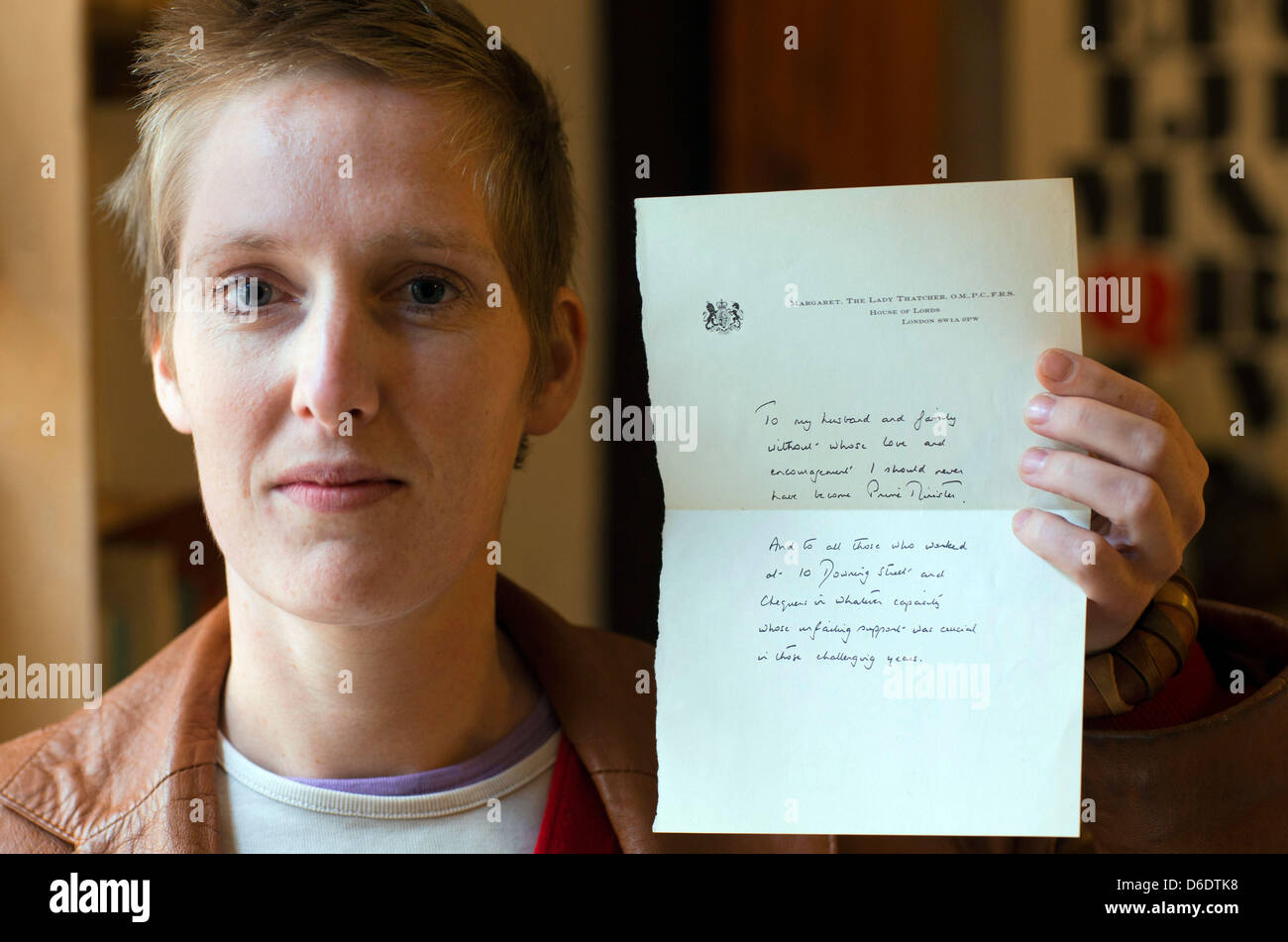 Antiquarian bookseller Katja Burmester presents a presumably real letter of former British Prime Minister Margaret Thatcher to her husband Denis in Wismar, Germany, 13 September 2012. The owner of the antiquarian bookshop 'Schuterjunge' found the letter one week ago in an English edition of Thatcher's autobiography 'The Downing Street Years'. The 'Iron Lady' thanks her husband for  Stock Photo