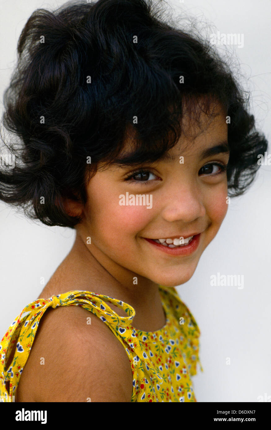 6 Year Old Girl With Dark Hair Sideways Pose Stock Photo 55625395