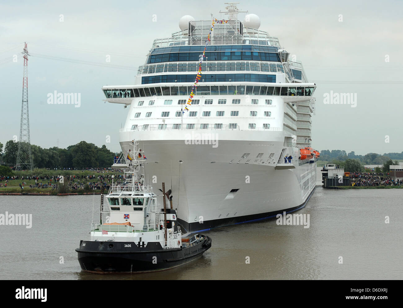 The new cruise ship 'Celebrity Reflection' leaves the fitting pier of the Meyer shipyard in Papenburg to be transferred to the North Sea, Germany, 16 September 2012. Photo: INGO WAGNER Stock Photo
